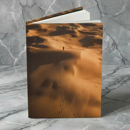 Lone Figure Walking Vast Golden Desert Dunes