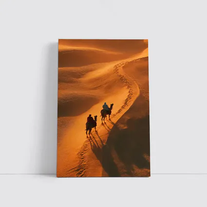 Camel Riders Crossing Golden Desert Dunes