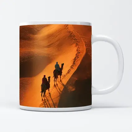 Camel Riders Crossing Golden Desert Dunes