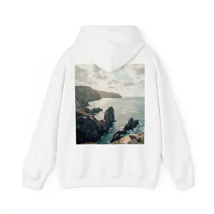 Rocky Coastal Cliffs Over Blue Ocean