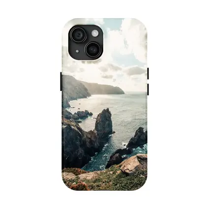Rocky Coastal Cliffs Over Blue Ocean
