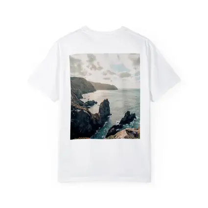 Rocky Coastal Cliffs Over Blue Ocean