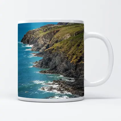 Rocky Coastal Cliffs Above Turquoise Ocean Waves