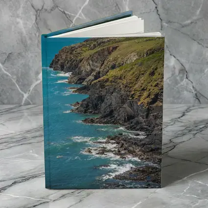 Rocky Coastal Cliffs Above Turquoise Ocean Waves
