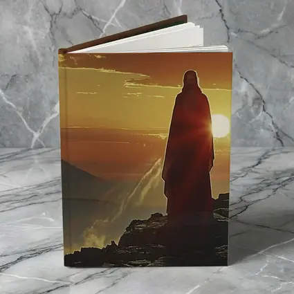 Jesus Standing on Rocky Cliff at Sunset