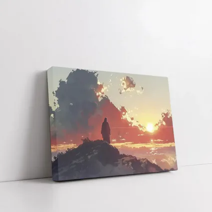 Lone Figure Standing on Rocky Sunset Cliff