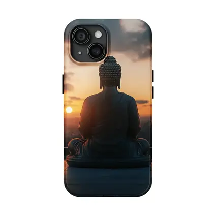 Buddha Statue Meditating Against Sunset Cityscape