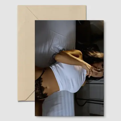 Sensual Woman Reclining On White Bed