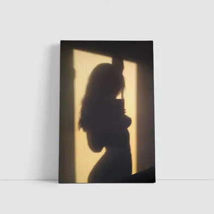 Woman Silhouette Shadow On Beige Wall