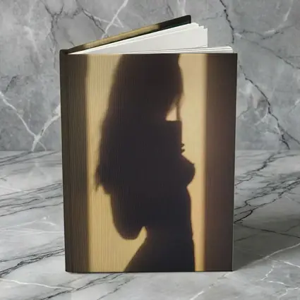 Woman Silhouette Shadow On Beige Wall