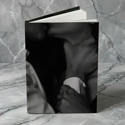 Intimate Black and White Couple Kiss Portrait