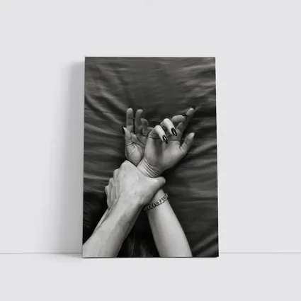Black and White Hands Grasping Bed Sheet