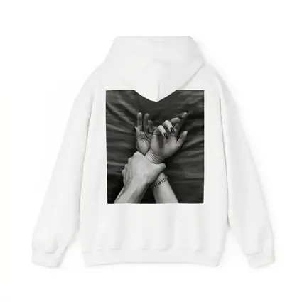 Black and White Hands Grasping Bed Sheet