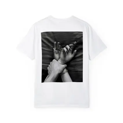 Black and White Hands Grasping Bed Sheet