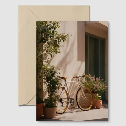 Vintage Bicycle Leaning Against Sunny Courtyard Wall