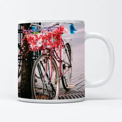 Pink Bicycle With Flowers On City Street