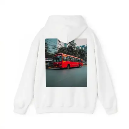 Red Bus Speeding Through Urban City Street