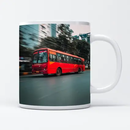 Red Bus Speeding Through Urban City Street