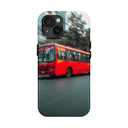 Red Bus Speeding Through Urban City Street