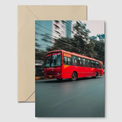 Red Bus Speeding Through Urban City Street