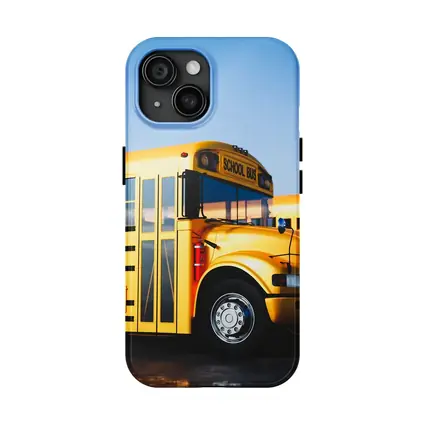Yellow School Buses Lined Up Blue Sky