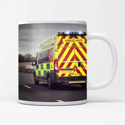 British Ambulance Speeding On Motorway Highway