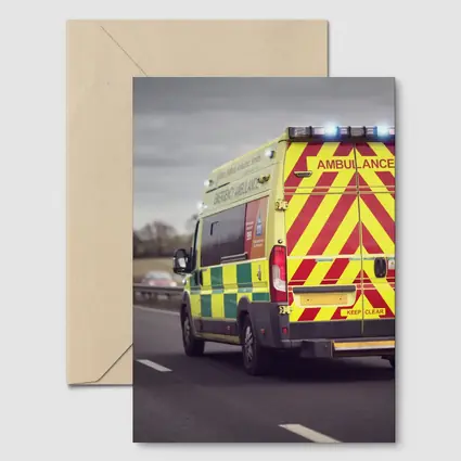 British Ambulance Speeding On Motorway Highway