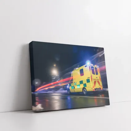 Ambulance Racing Through City Night Streets