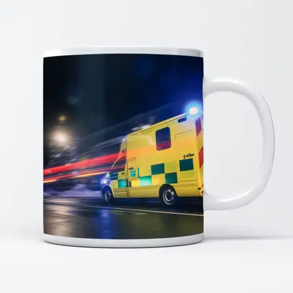 Ambulance Racing Through City Night Streets