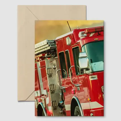 Red Fire Truck Racing Toward Wildfire