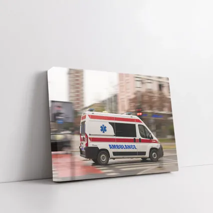 Ambulance Speeding Through City Street