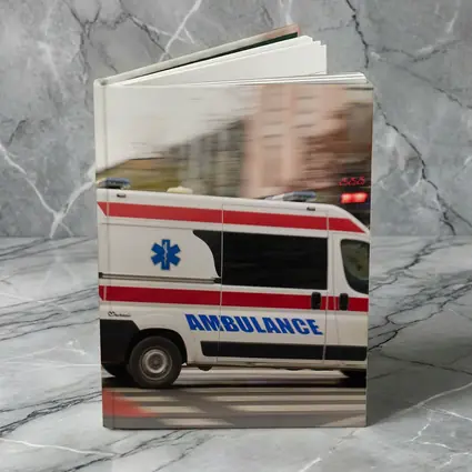 Ambulance Speeding Through City Street