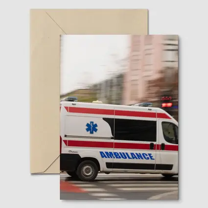 Ambulance Speeding Through City Street