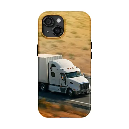 White Semi Truck Speeding Down Desert Highway