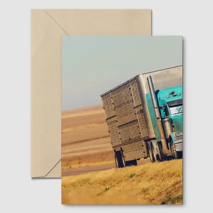 Semi Truck Driving Through Open Plains