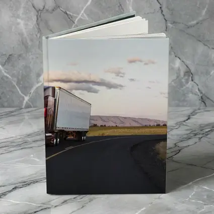Red Semi Truck on Open Country Road