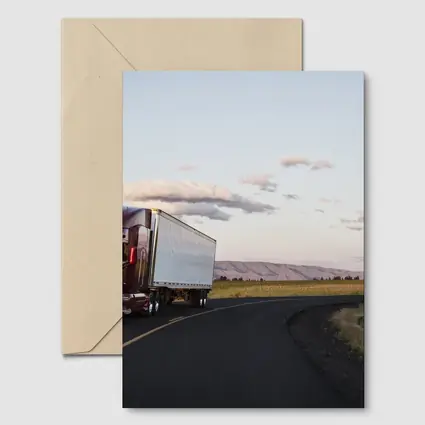 Red Semi Truck on Open Country Road