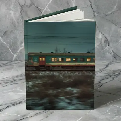 Old Train Moving Through Snowy Winter Landscape