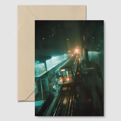 Night Train Arriving At Elevated City Station