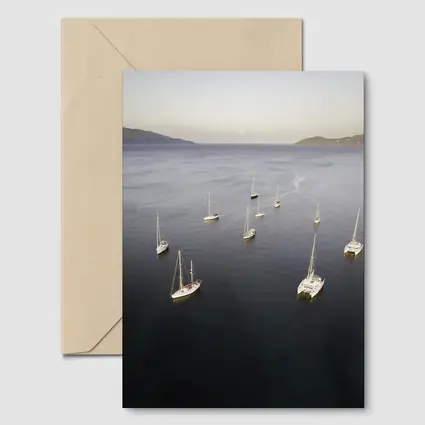 Sailboats Anchored in Calm Blue Bay