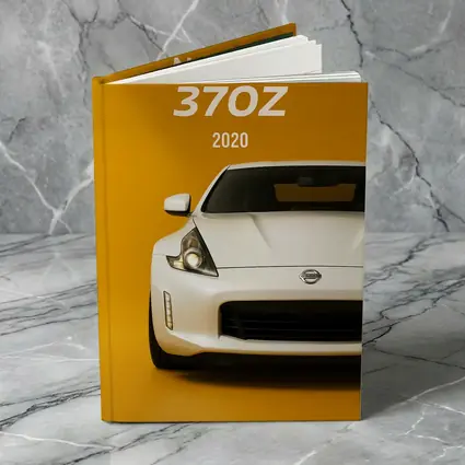 Nissan 370Z White Car Yellow Background