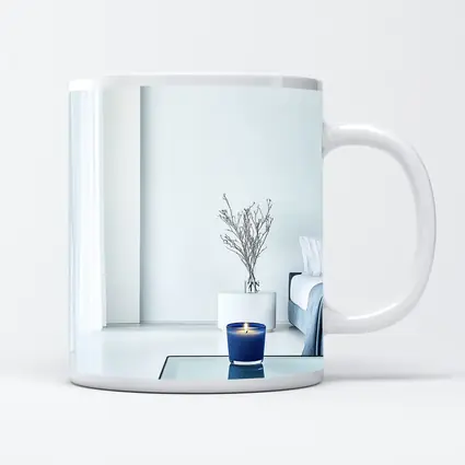 Blue Candle Glowing in Minimalist White Room