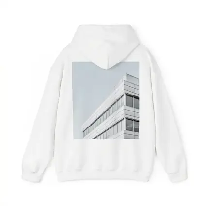 White Modern Building Corner Against Gray Sky
