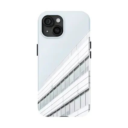 White Modern Building Corner Against Gray Sky