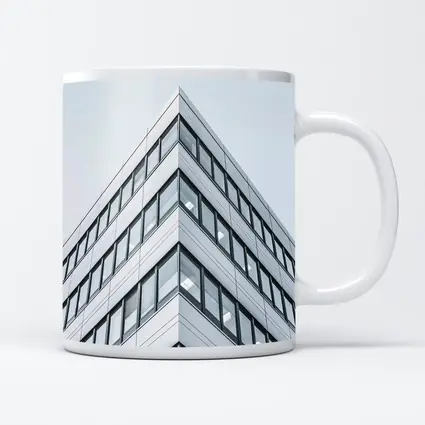 Modern Office Building Corner Against Gray Sky