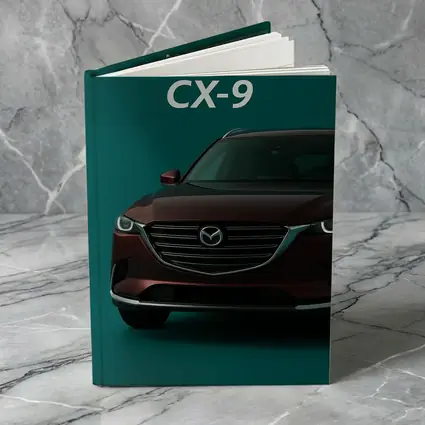Mazda CX Nine Deep Red Teal Background
