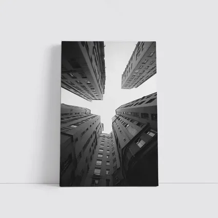 Looking Up Between Gray City Buildings