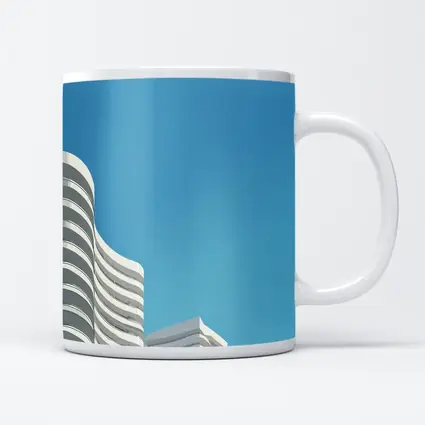 White Curved Buildings Against Blue Sky