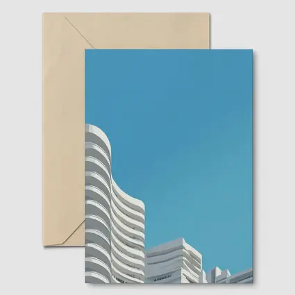 White Curved Buildings Against Blue Sky