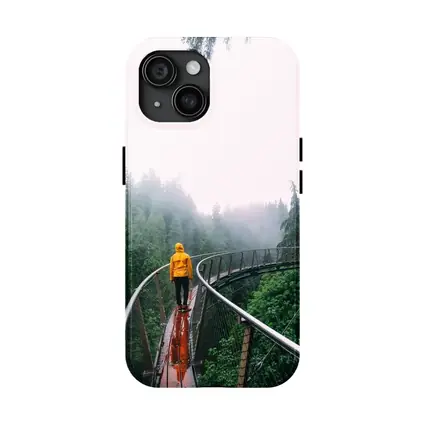Yellow Jacket Hiker on Misty Forest Bridge